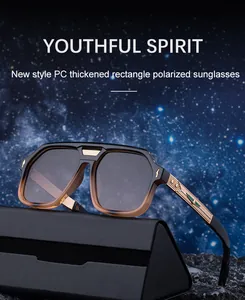 Close-up of square polarized sunglasses with brown gradient lenses and gold metal temples