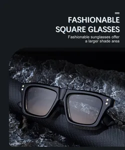 Detail view of square black sunglasses with golden rivet accents and ZS98502 model size text