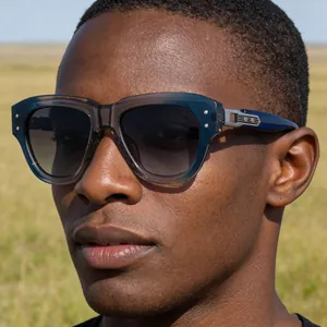 Close-up of polarized cat-eye sunglasses featuring blue gradient frames and metal details