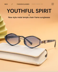 Macro shot of marble textured hexagonal sunglasses with gradient lenses and metal temples