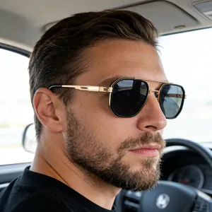 Male model wearing black and gold square polarized sunglasses while driving in a car