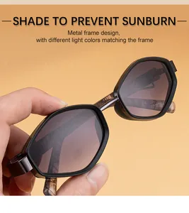 Detail of polygonal sunglasses with metallic frame and wood grain temples on orange backdrop