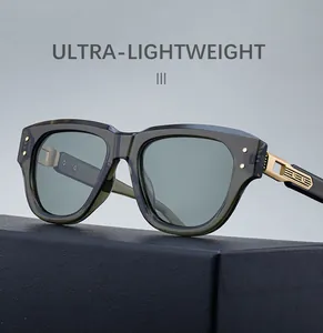 Detail of green sunglasses showing engraved gold metal hinge and ultra-lightweight frame