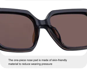 Détail macro des plaquettes de nez monobloc sur lunettes de soleil pour le confort