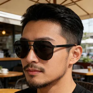 Classic pilot polarized sunglasses with dark metal frames on a male model outdoors