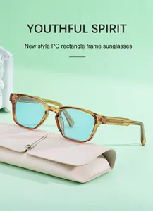 Close-up of amber rectangle sunglasses with light blue lenses and a beige leather case