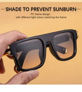 Detalle de gafas de sol cuadradas con remaches dorados y número de modelo 5984 grabado