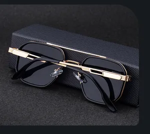 Detail of square polarized sunglasses showing golden double bridge and hinge textures