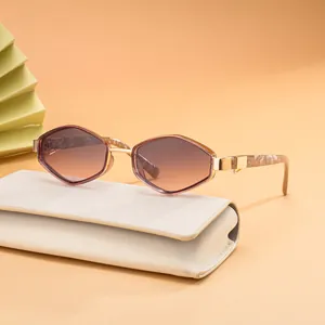 Fashionable hexagonal sunglasses with gradient brown lenses and marble temples