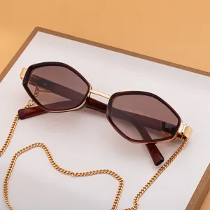 Chic polygonal sunglasses with brown gradient lenses and gold chain for women
