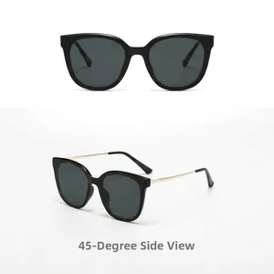 Vue latérale détaillée à 45 degrés de lunettes de soleil œil de chat aux branches dorées