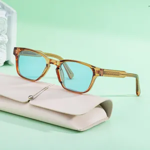 Fashion square amber sunglasses with light blue lenses and pink leather pouch
