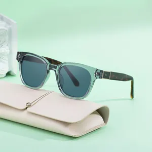 Chic square sunglasses with olive green frames and tortoiseshell temples including leather case