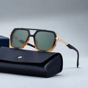 Square double bridge sunglasses with amber gradient frame and gold metal temples