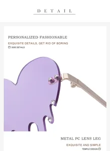 Detail of purple melting heart sunglasses with rhinestone water drop tassels and gold arms