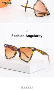 Dettaglio degli occhiali da sole cat-eye tartarugati con accenti in metallo oro