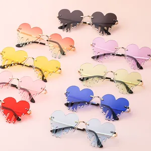 Fashionable melting heart rimless sunglasses with rhinestones in various colors