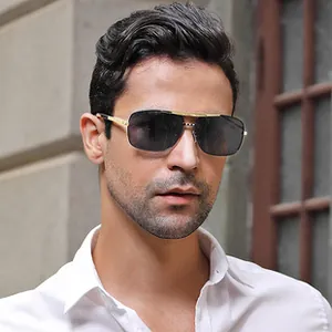 Outdoor shot of man wearing pilot smart glasses with gold frame and dark gray lenses