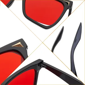Occhiali da sole cat-eye da donna con montatura nera e lenti rosse e borchie