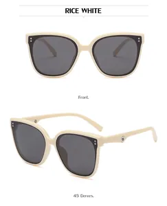 Detailed front and 45-degree view of rice white cat-eye sunglasses with metal rivets