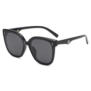 Classic oversized black cat-eye sunglasses with stylish silver metal ring accents