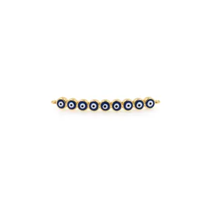 Dettaglio del connettore placcato oro 18K con dieci ciondoli occhio di Allah blu