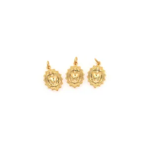 Three 18K gold plated heart cross pendants for DIY jewelry making on white background
