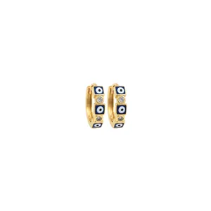 Macro detail of 18K gold plated huggie hoops with blue evil eye enamel and cubic zirconia
