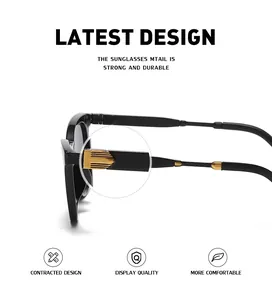Macro view of black sunglasses with premium gold metal hinge decor on the temple arm
