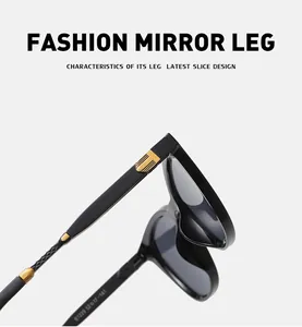 Detailed macro view of black sunglasses temples with textured gold metal accents
