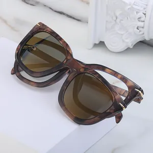 Lunettes de soleil œil de chat vintage avec motif écaille et détails en métal doré