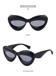 Front and side view of chic black cat-eye sunglasses with bold frames and gray lenses
