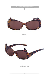 Vue macro de lunettes de soleil Y2K chauve-souris avec monture marron et verres foncés