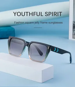 Detail of square jelly frame sunglasses with green gradient finish and blue arrow hinge