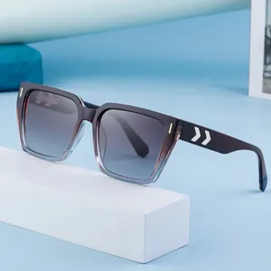 Retro square sunglasses for men with grey to blue gradient frames and silver arrow accents