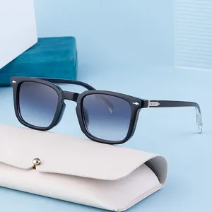Vintage black square sunglasses with blue gradient lenses and silver metal arrow accents