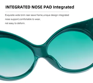 Detail of integrated nose pads on green oval frame sunglasses for enhanced comfort