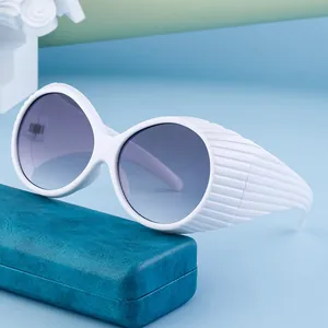 Oval oversized sunglasses with white frames, striped temples and purple gradient lenses