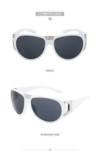 Detail view of white frame sunglasses with metal screw bridge and grey lenses