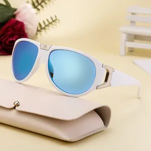 White frame oversized sunglasses with blue polarized lenses and leather folding case
