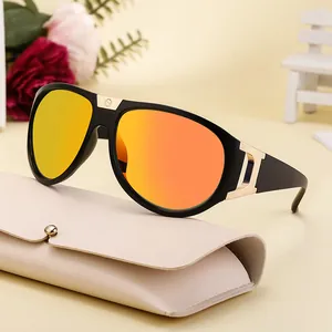 Fashionable sports sunglasses with black frames and orange gradient mirrored lenses