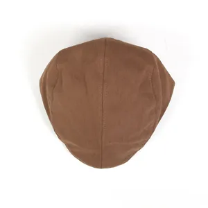 Top-down view of brown cotton ivy cap with stitching details and twill texture fabric
