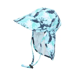 Kids sun hat with blue dinosaur print featuring neck protection and breathable mesh