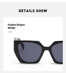 Detail show of chunky black cat eye sunglasses with thick temples and a unique fashion design