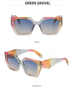 Detail view showing wide-temple cat-eye sunglasses with multi-color marble texture