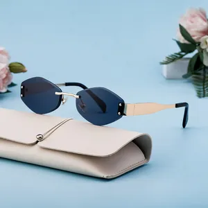 Chic diamond-cut rimless sunglasses for women with gold frame and leather pouch