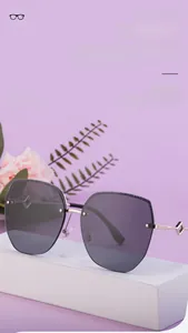 Detail of grey nylon lenses with glitter edges and slim metal temples on fashion sunglasses