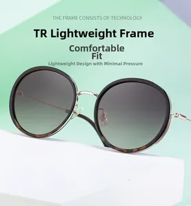 Detail of lightweight TR frame sunglasses with gold bridge and tortoiseshell finish