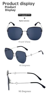 Detail view of square half-frame sunglasses in silver metal with gray nylon lenses