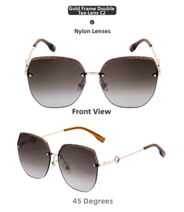 Detail view of large square gold metal sunglasses with brown nylon gradient lenses